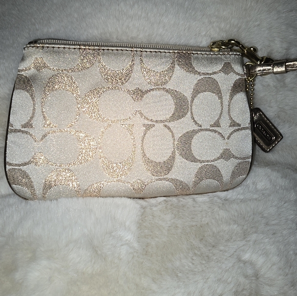Cream and rose gold Coach wristlet - Picture 1 of 10